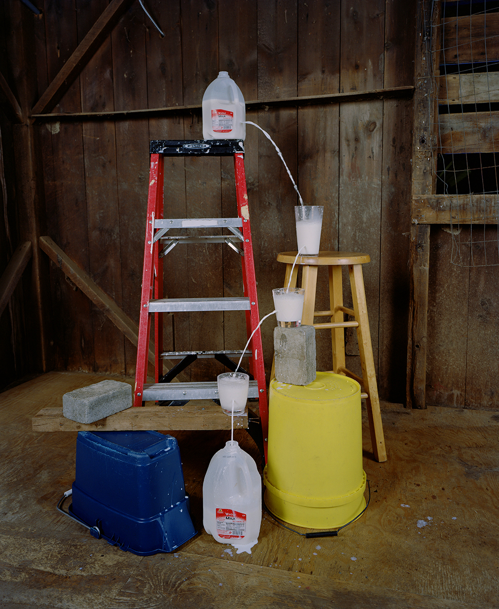 Adam Ekberg, Transferring a gallon of milk from one container to another, 2014, archival pigment print, 50 x 40 inches, Courtesy of the artist and ClampArt, New York City 